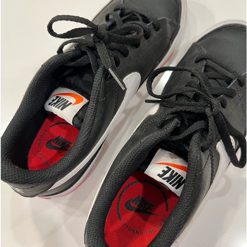 Nike black leather sneakers